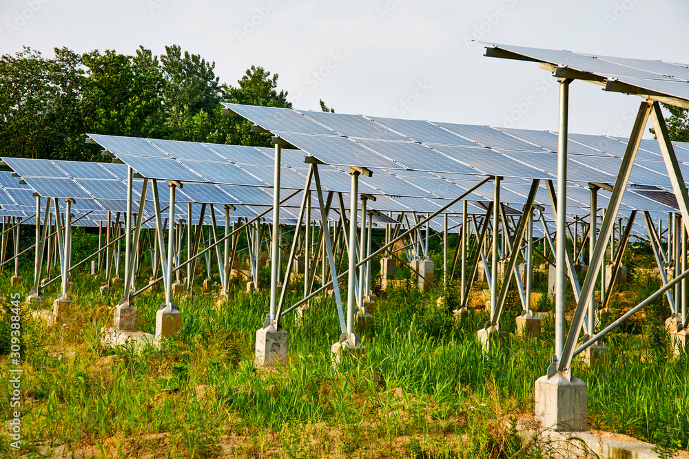 Fototapeta premium Solar photovoltaic cells built with steel supports