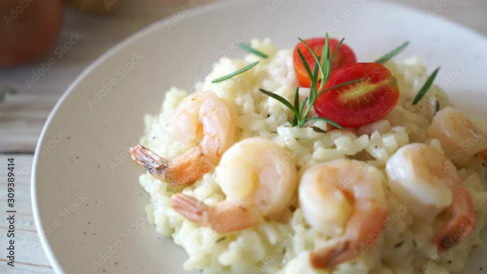 Italian risotto with shrimps - Italian food style Italian risotto with shrimps - Italian food style