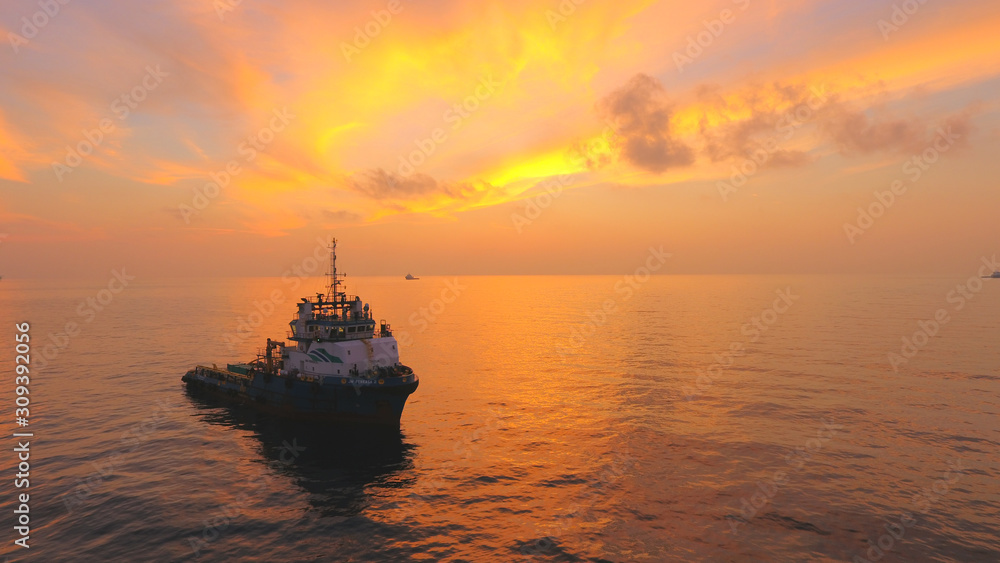 Oil and gas supply boat, transportation to bring all drilling equipment from shore to rig or platform.