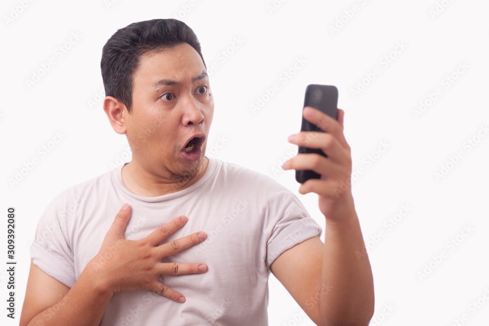 Young Man Texting Reading Chatting on His Phone Sad Crying Young Man Texting Reading Chatting on His Phone Sad Crying