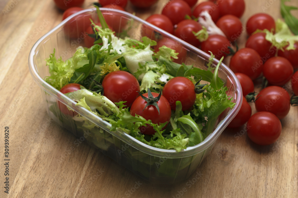 Spring composition salad and tomatoes. Spring composition salad and tomatoes.