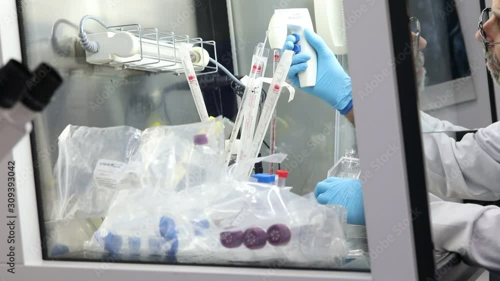 Details of pipettes, flasks and test tubes in a scientific lab Details of pipettes, flasks and test tubes in a scientific lab