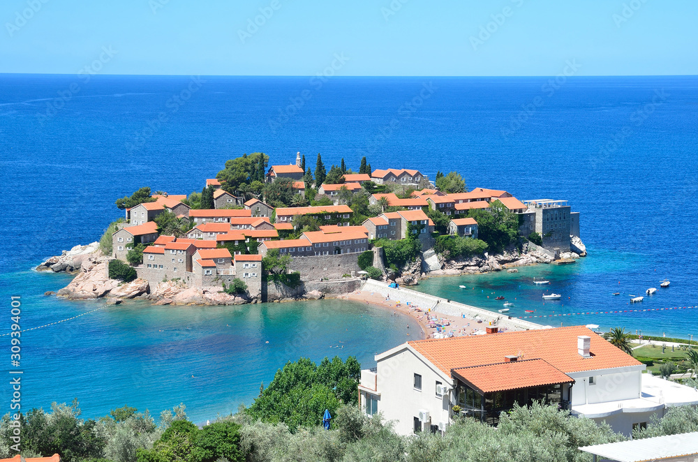 The beautiful island of Sveti Stefan (Sveti Stephan) in the Adriatic sea in the summer. Montenegro