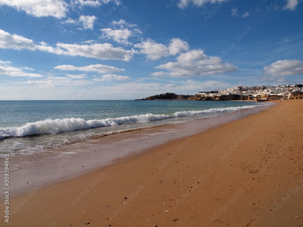 Beautiful long beach in Albufeira in Portugal Beautiful long beach in Albufeira in Portugal