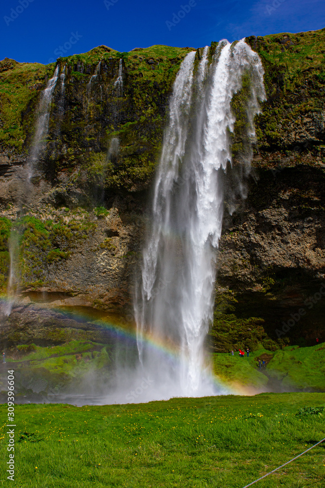 Seljalandsfoss waterfall in Iceland during summer Seljalandsfoss waterfall in Iceland during summer