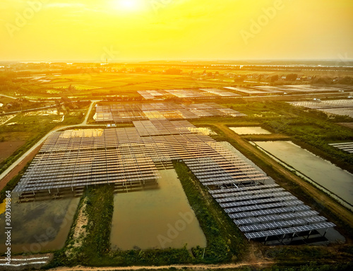 Photography Aerial outdoor solar photovoltaic base in Asia under sunset