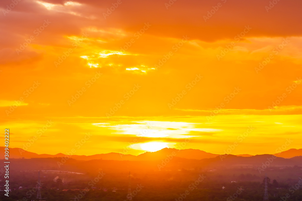Beautiful landscape with sunrise or sunset over mountain Beautiful landscape with sunrise or sunset over mountain