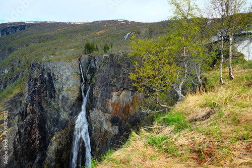 View of Voringsfossen waterfall, Mabodalen valley Norway. National tourist Hardangervidda route, Eidfjord, Hardangerfjord, Norway.