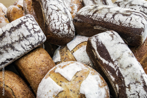 different varieties and types of bread. Loaves, rolls, loaves and other bread background