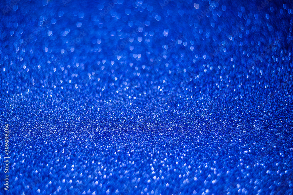 Classic blue abstract glitter and shine background. Trendy blue sparkling backdrop with selective focus. Part of set. Classic blue abstract glitter and shine background. Trendy blue sparkling backdrop with selective focus. Part of set.