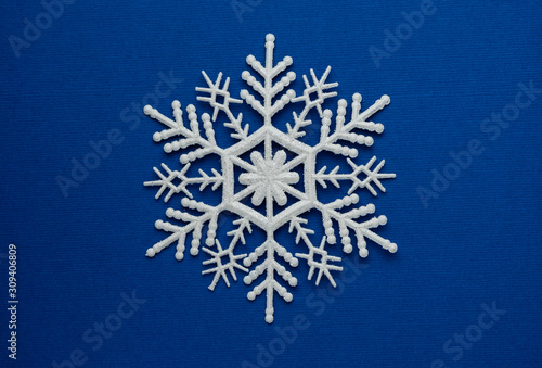 selective focus, white decorative snowflake