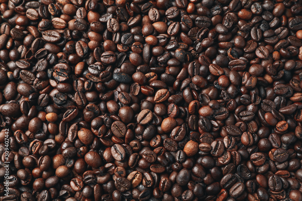 Textured background of coffee beans, top view Textured background of coffee beans, top view