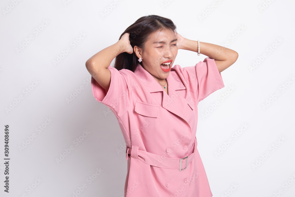 Stressed young Asian businesswoman scream out. Stressed young Asian businesswoman scream out.