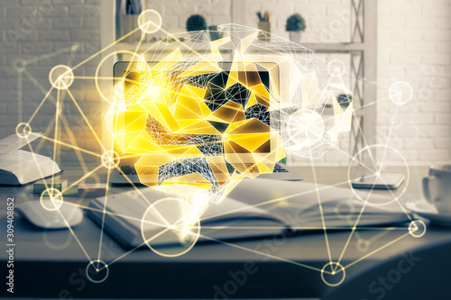 Double exposure of table with computer and brain hologram. Data innovation concept.