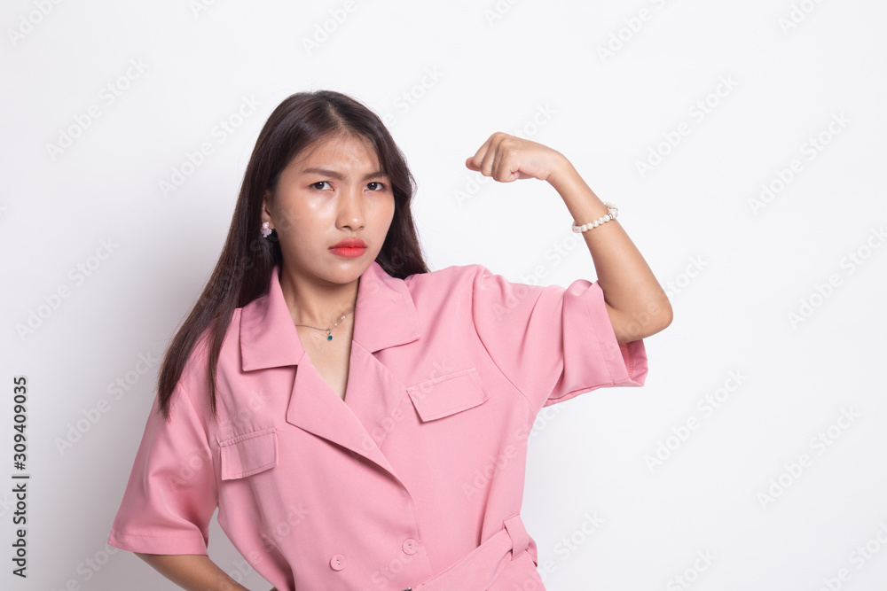 Beautiful young Asian woman flex bicep. Beautiful young Asian woman flex bicep.