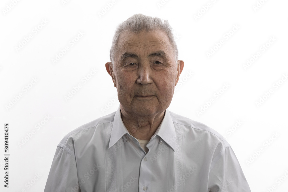 close-up portrait of an old asian man on white studio background close-up portrait of an old asian man on white studio background