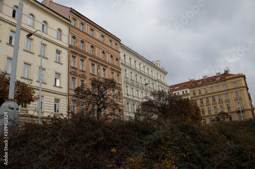  The streets of the historical districts of the Czech capital city of Prague on Christmas Eve on a cloudy day. View of the architecture. © Olena