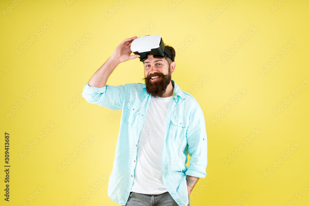 Digital space. Entertainment. Testing software. Bearded man yellow background vr glasses. Create own reality. Digital future and innovation. Developing digital technologies. Limited library of apps
