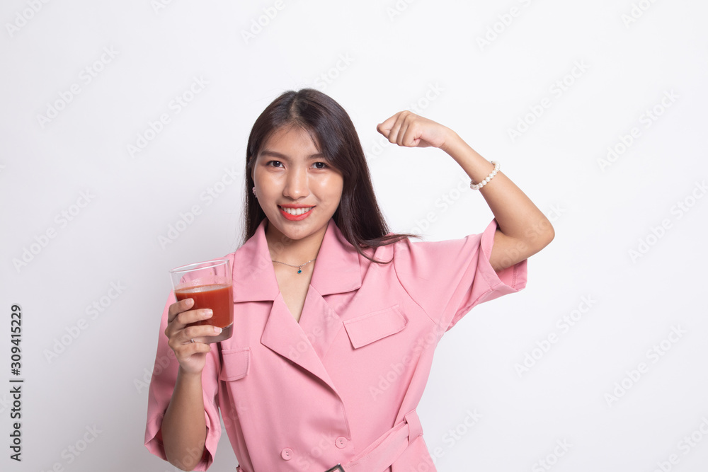 Strong healthy Asian woman with tomato juice. Strong healthy Asian woman with tomato juice.