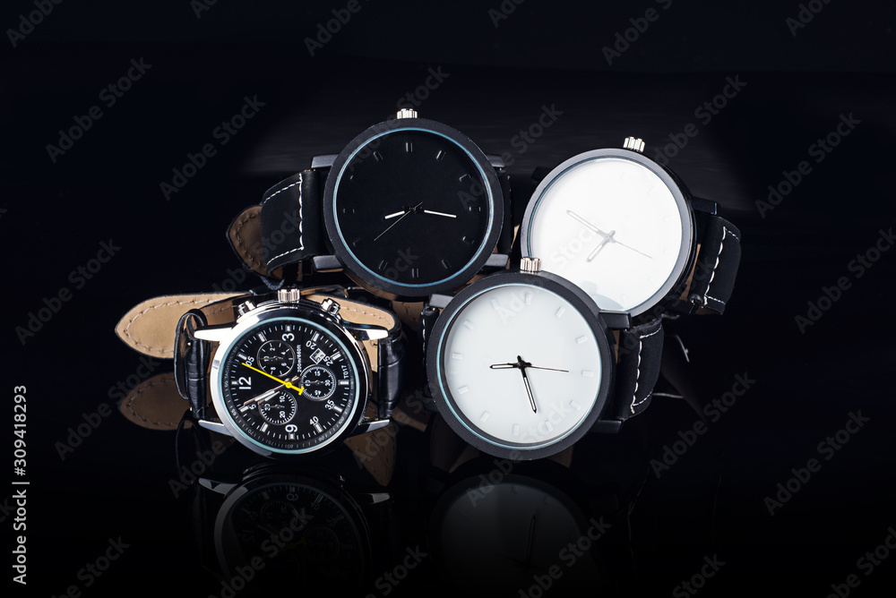 Wrist watch on black background with reflection Wrist watch on black background with reflection