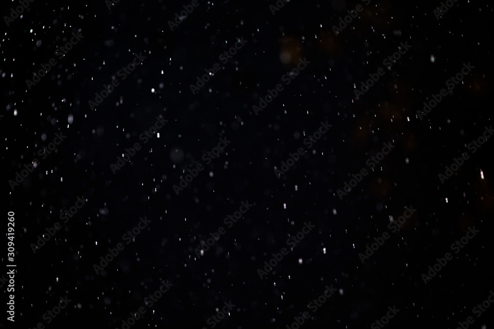 Falling snow on black background. Design element as overlay. Christmas concept Falling snow on black background. Design element as overlay. Christmas concept