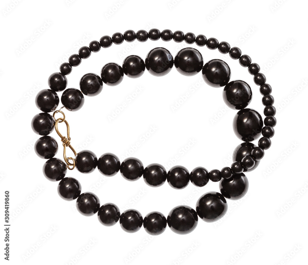 coiled necklace from polised jet stone isolated coiled necklace from polised jet stone isolated