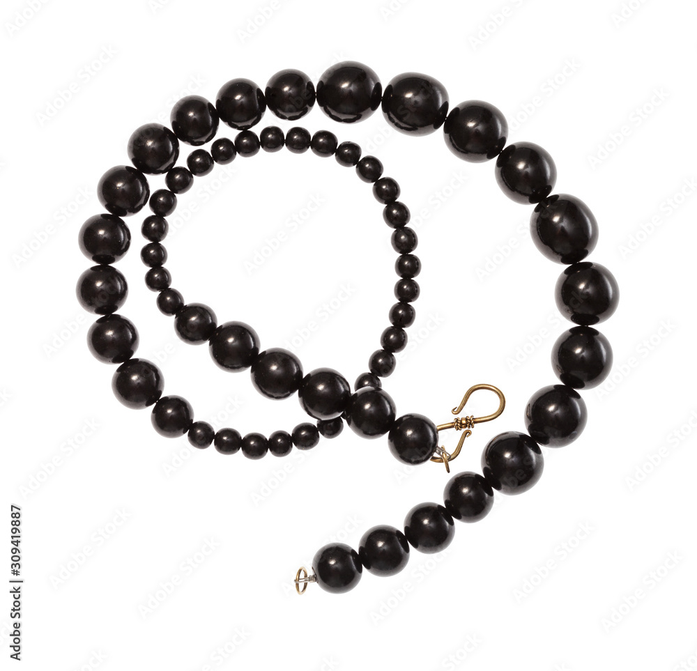 spiral necklace from polised jet stone isolated spiral necklace from polised jet stone isolated