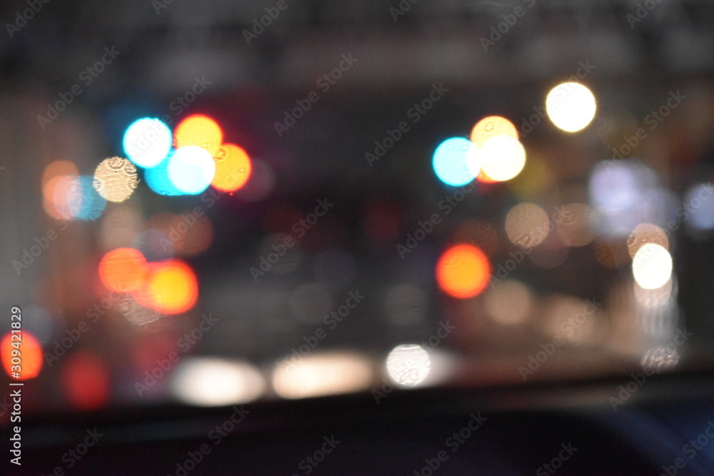 golden and colorful light bokeh at night on the road background golden and colorful light bokeh at night on the road background