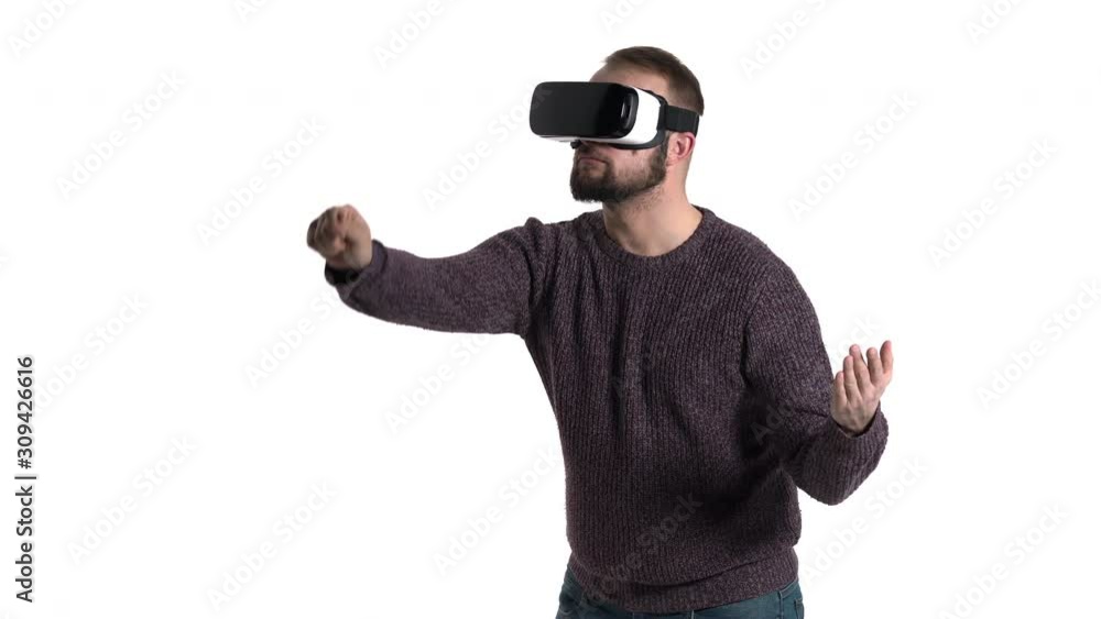 Close-up demonstration of a young bearded man imitating picture painting in VR glasses. 3D rendering animation. Hi tech concept Close-up demonstration of a young bearded man imitating picture painting in VR glasses. 3D rendering animation. Hi tech concept