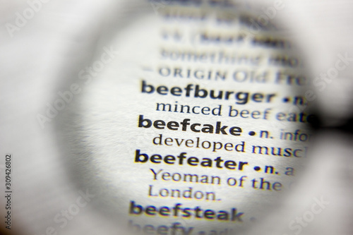 The word or phrase Beefcake in a dictionary.