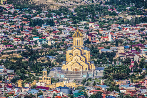 Holy Trinity Cathedral of Tbilisi Georgia in city panorama - taken from above in summer.