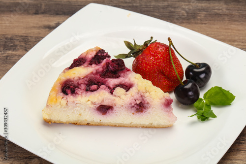 Cheesecake with cherry served strawberry