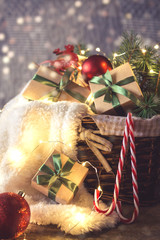 Christmas and zero waste, eco friendly packaging gifts in kraft paper on a wooden table, eco christmas holiday concept, eco decor banner.