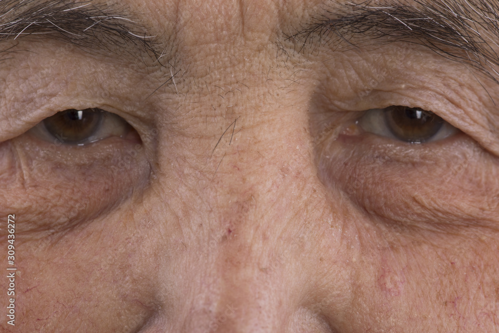 Fototapeta premium old man eyes macro closeup