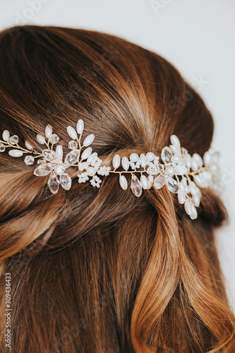 Close up image of trendy bridal hairstyle with beautiful wedding accessoires