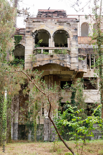 Abandoned sanatorium in Kobuleti, a high calving building on the first line photo