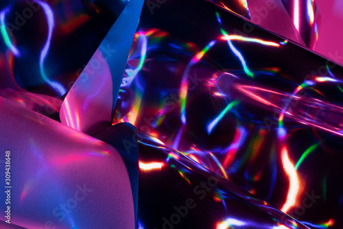 Reflection of light on holographic foils with neon lighting