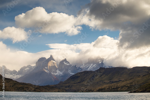 View of the Torres del Paine mountains between the clouds, Torres del Paine National Park, Chile