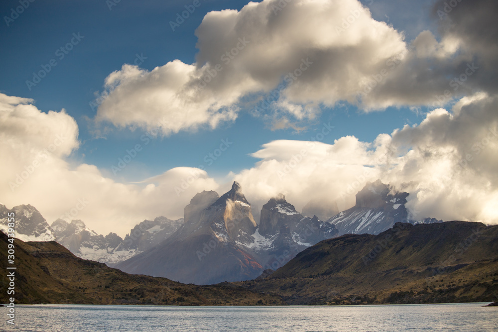 View of the Torres del Paine mountains between the clouds, Torres del Paine National Park, Chile