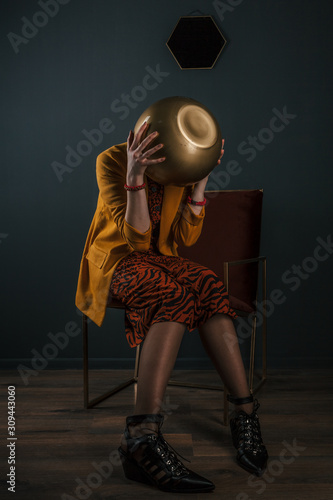 Young woman bizarre fashion portrait photo