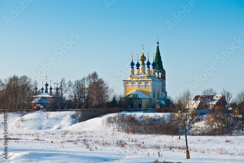 The Church of the Nativity of the Blessed Virgin Mary with a bell tower and the Church Ascension in the village of Gorica/ Ivanovo region/ Russia/ Winter landscape/ Golden Ring of Russia Travel