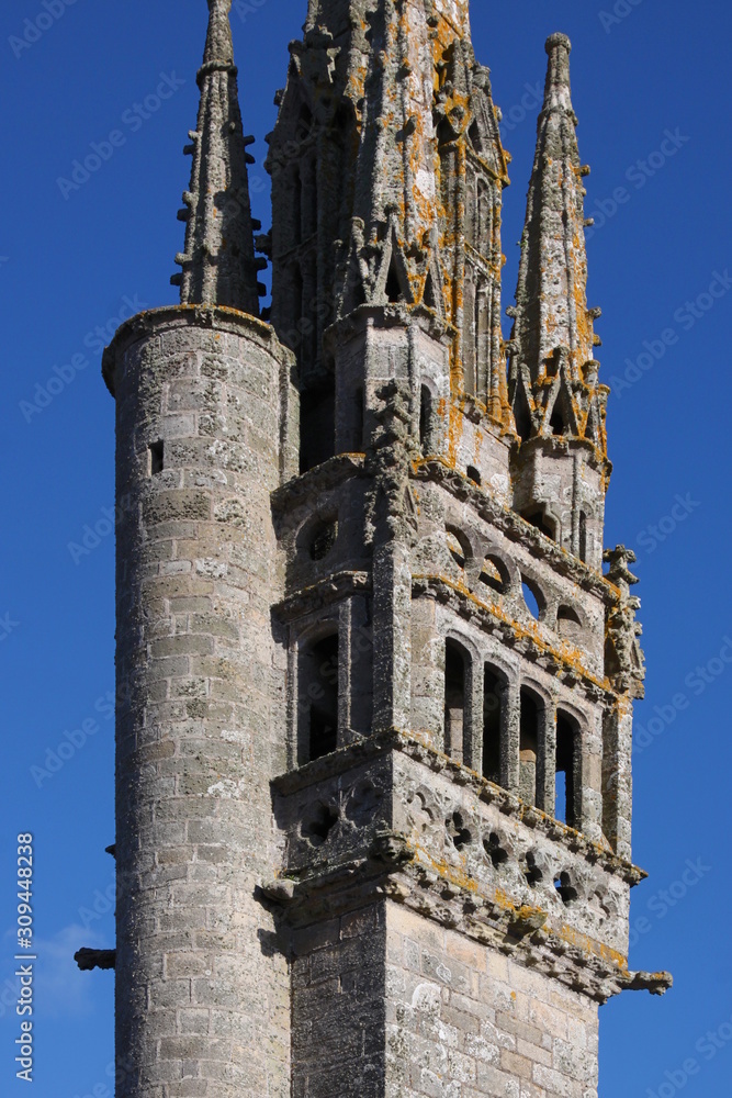 Architectural detail of the gothic church steeple of St Clet in Cléden-Cap-Sizun, Brittany in France