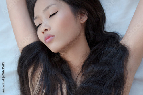 beautiful asian woman with long hair photo
