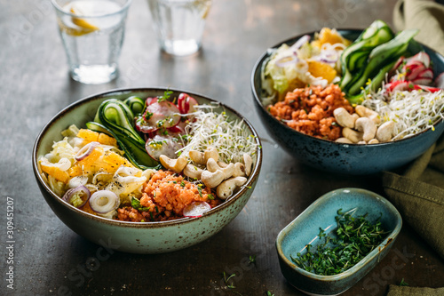Food: Healthy salad bowl with vegetables, cereals and nuts
