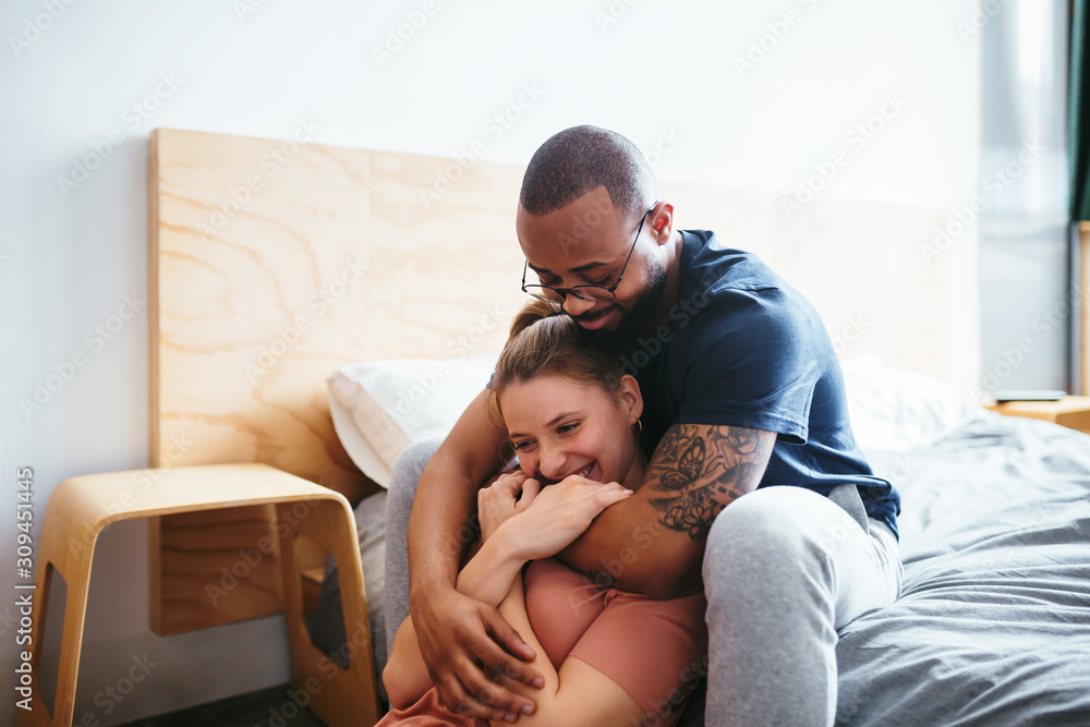 Multiethnic lovers on bedroom. Multiethnic lovers on bedroom.