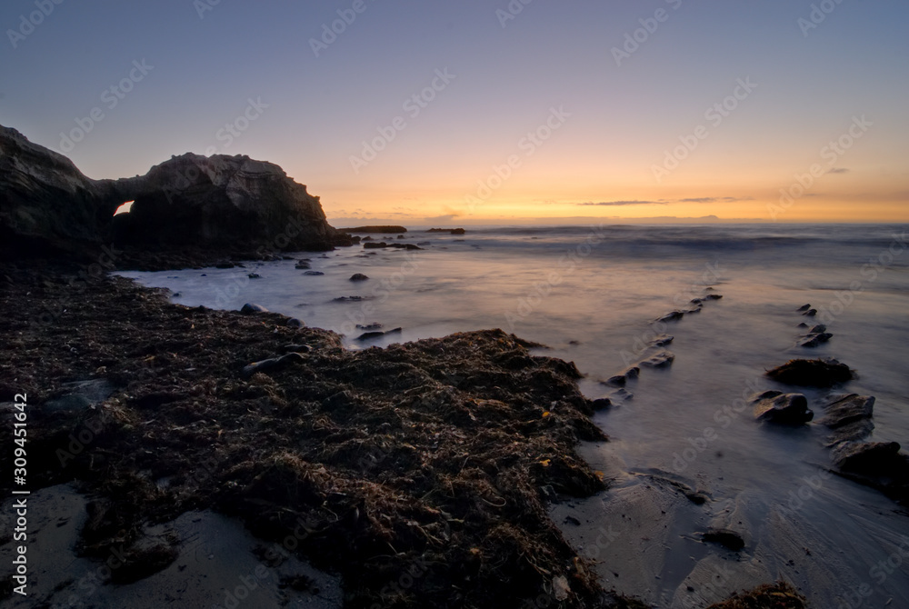 Sunset along the rocky California coast.