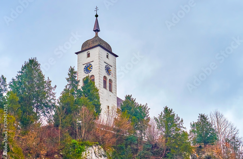 The high bell tower of Johannesbergkapelle, Traunkirchen, Austria photo