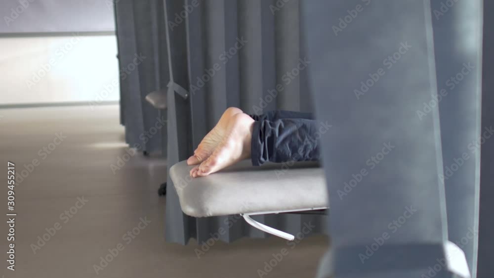 Therapist Treating Injury of Professional Athlete Male Patient. Black Massage Gun. Professional Massage the Body. Sport Physical Therapy Concept. - Video