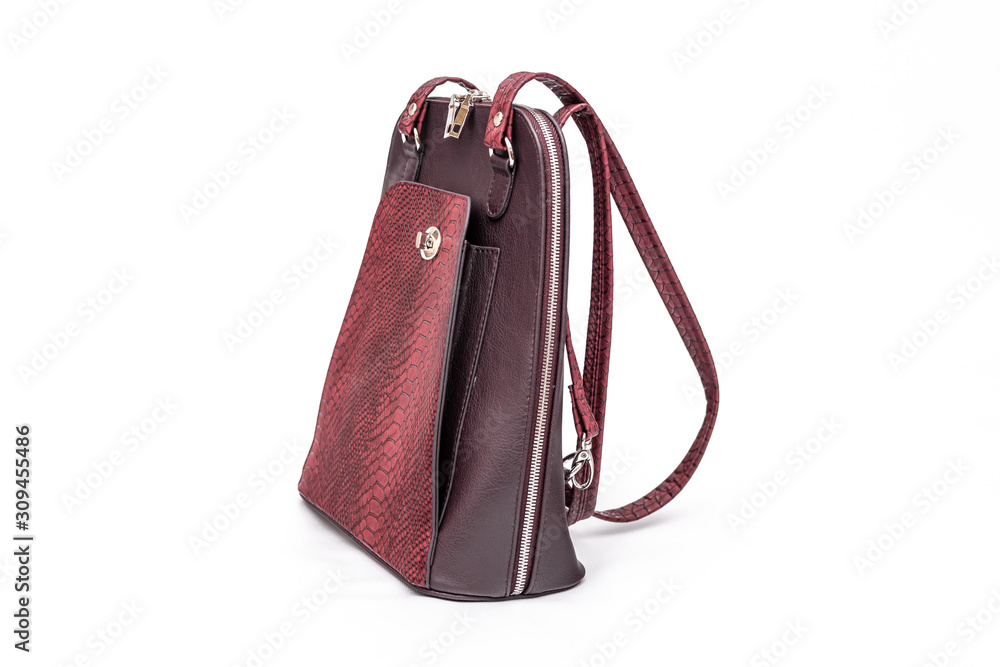 Fashion women leather dark red backpack isolated on a white background.