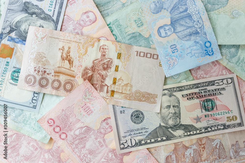 Close up Thai money note and dollars using as background stacking, Business concept Close up Thai money note and dollars using as background stacking, Business concept